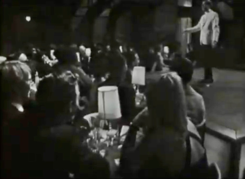 Kenneth Williams in front of the audience on International Cabaret, 6 September 1966